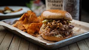 Doc Crow's Southern Smokehouse & Raw Bar signature dishes Pulled Pork Sandwich
Brisket Tacos
Baby Back Ribs